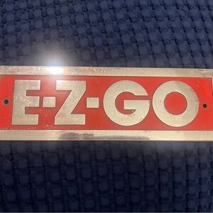 E-Z-GO Red and Silver Metal Sign